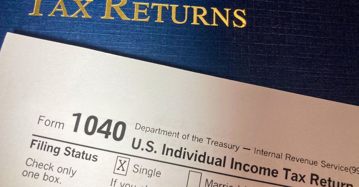 Close-up image of Form 1040 for U.S. tax returns, highlighting filing status options.